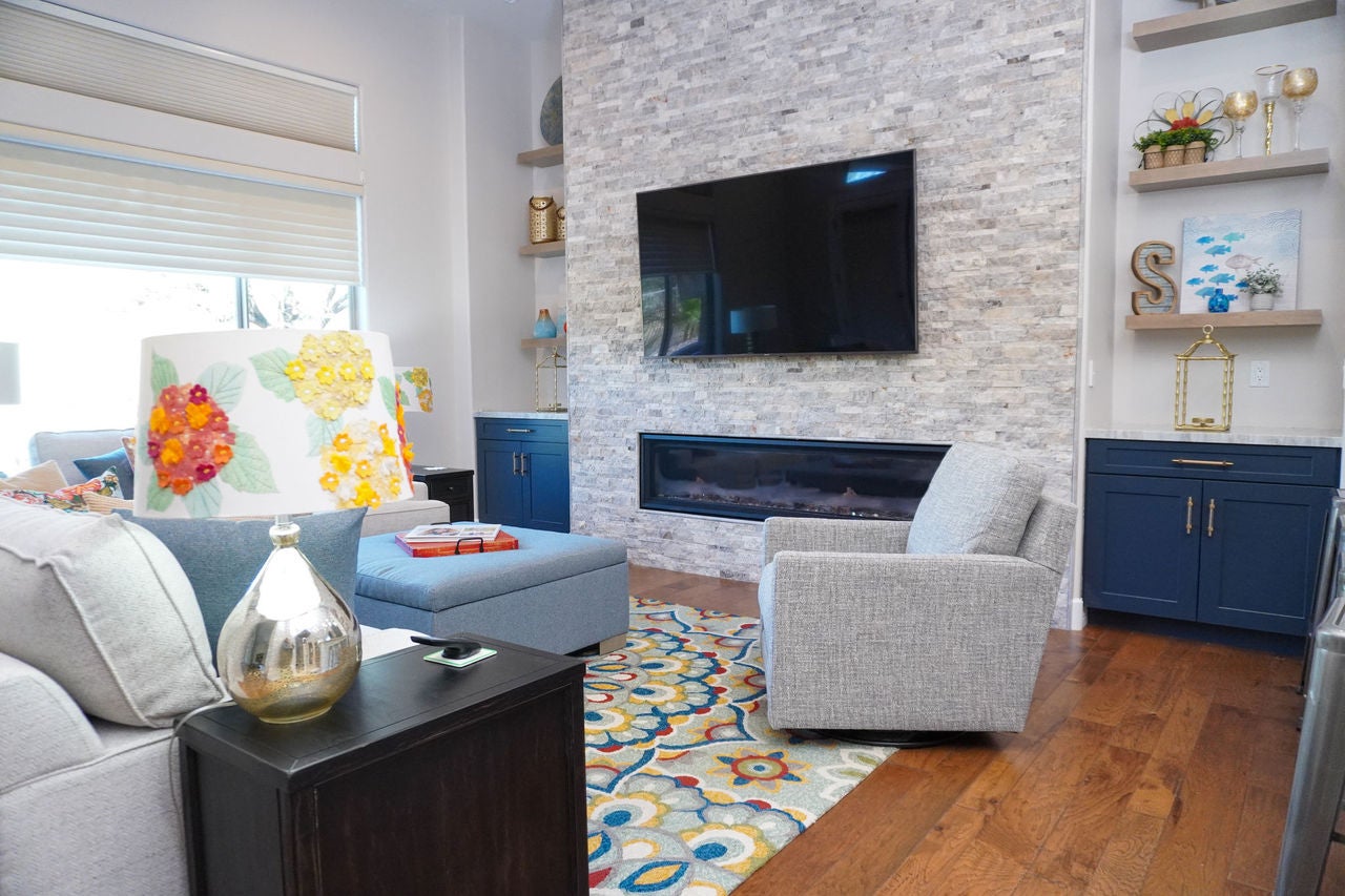 living room with navy cabinetry