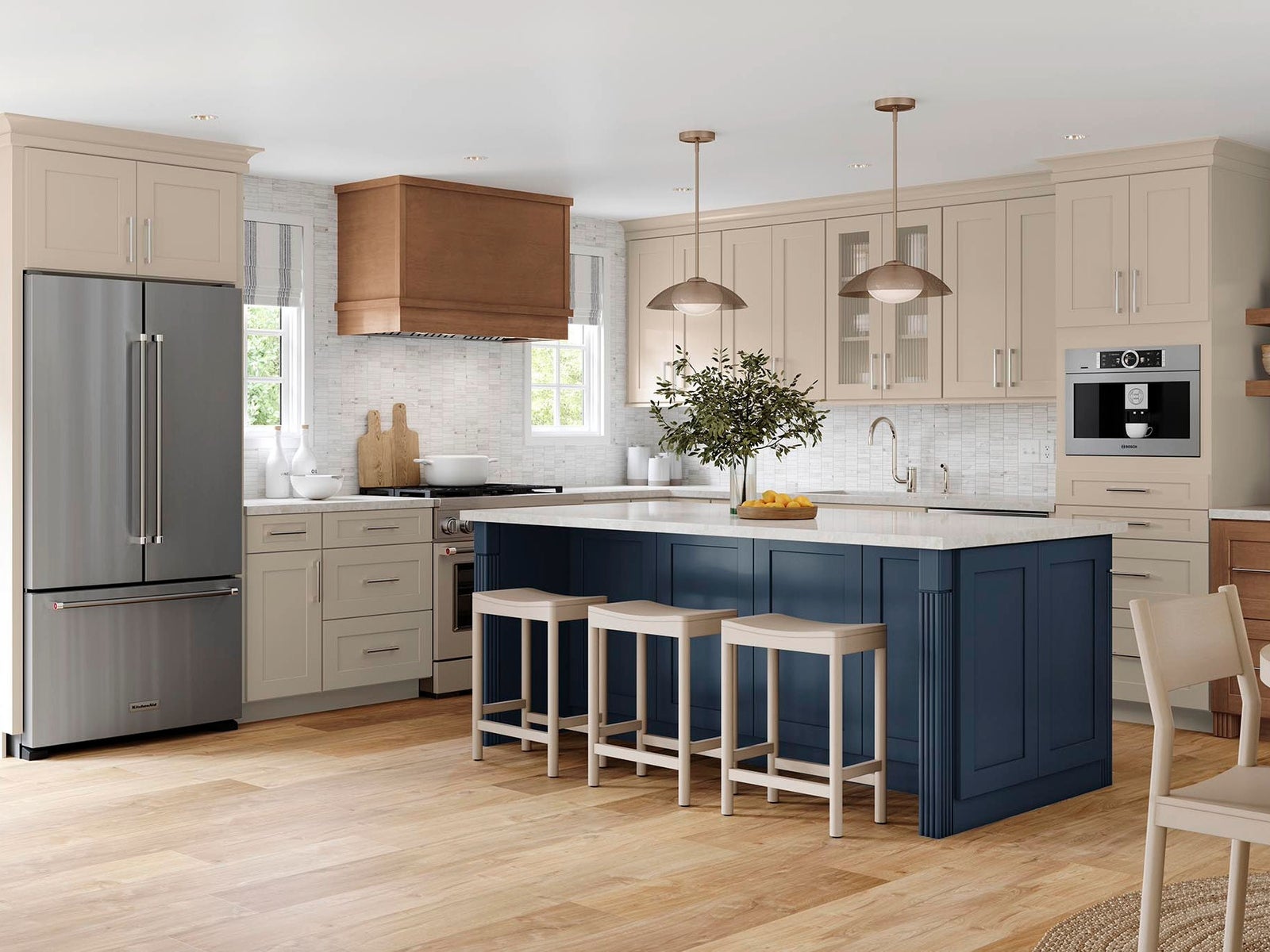Kitchen with painted oat, maple cider and painted navy shaker cabinets